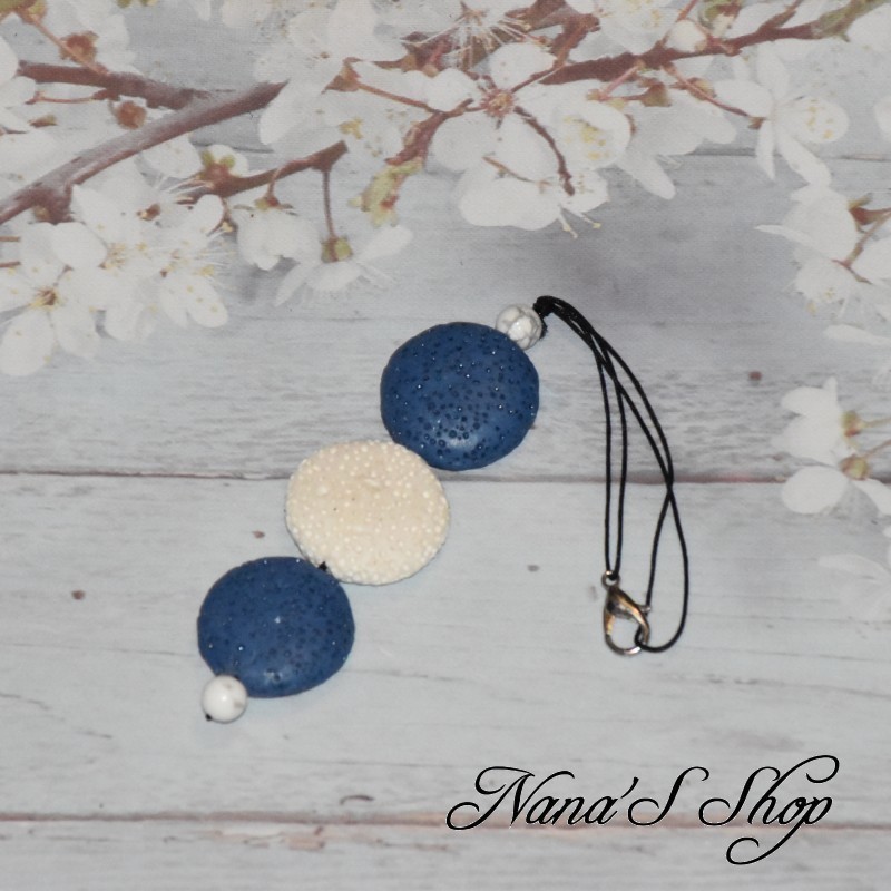 Diffuseur d' huile essentielle, pour rétroviseur, modèle 12, coloris bleu et blanc.