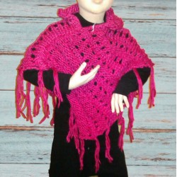 Poncho fille, taille unique coloris rose fuchsia.