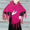 Poncho fille, taille unique coloris rose fuchsia.