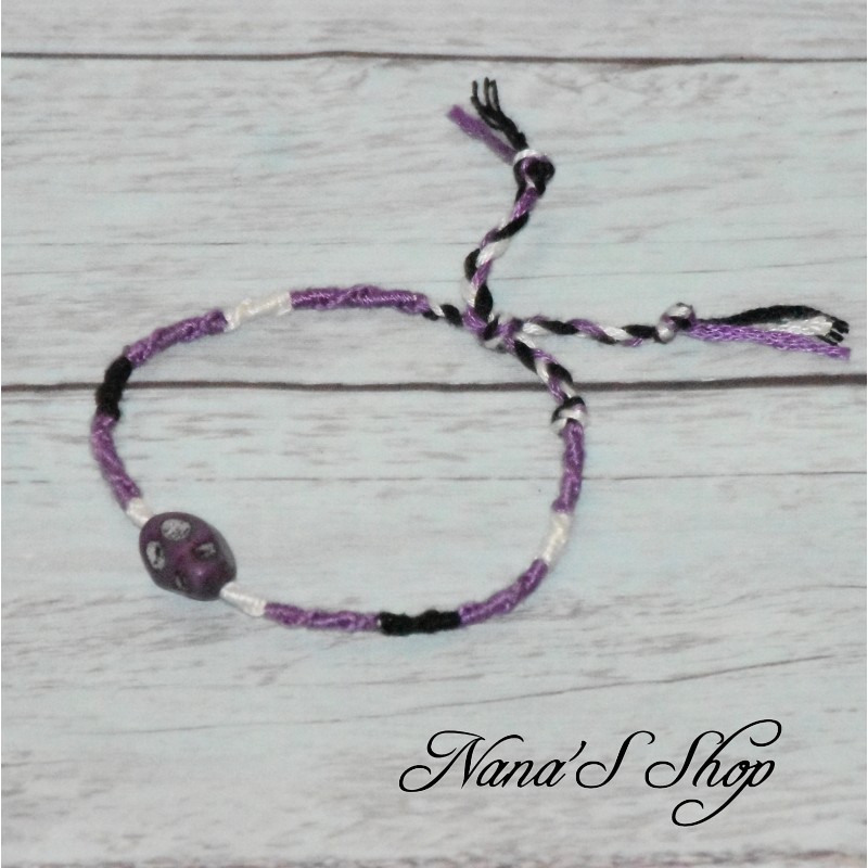 Bracelet brésilien, avec perle tête de mort, coloris violet.