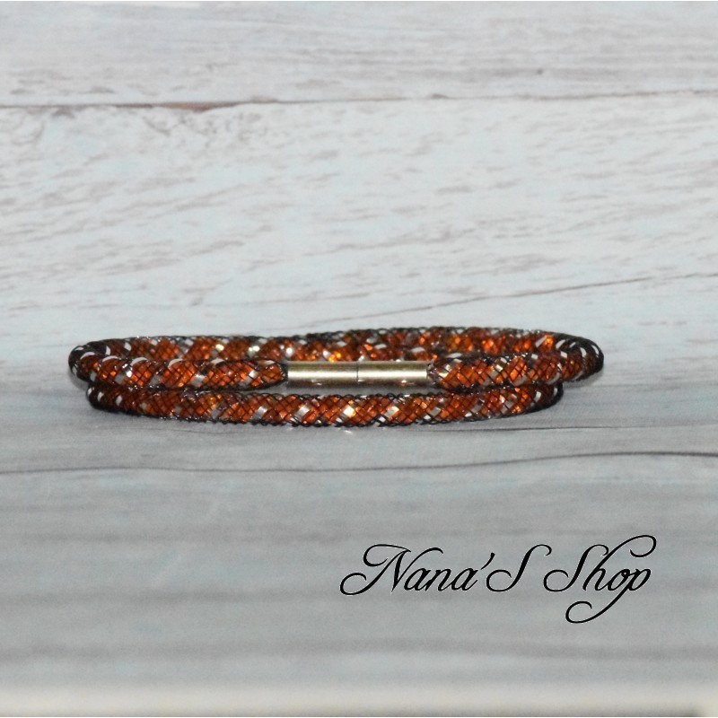 Collier ou bracelet double, fine résille noir et strass, effet Stardust, coloris orange. Collier ou bracelet double, fine résille noir et strass, effet Stardust, coloris orange.