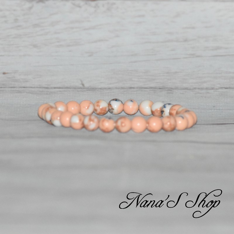 Bracelet élastique en perles de Calcite, coloré corail, beige et bleu. Bracelet élastique en perles de Calcite, coloré corail, beige et bleu.