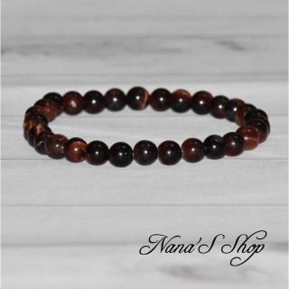 Bracelet fait main, en œil de taureau, dans les tons rouge marron foncé.