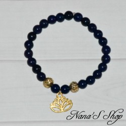 Bracelet élastique, en perles de verre teinté bleu foncé et fleur de Lotus en métal doré.