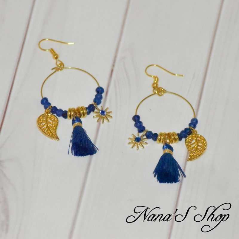 Boucles d'oreilles dorée de style Bohème, Pompons Tassel et perles, coloris bleu royal. Boucles d'oreilles dorée de style Bohème, Pompons Tassel et perles, coloris bleu royal.