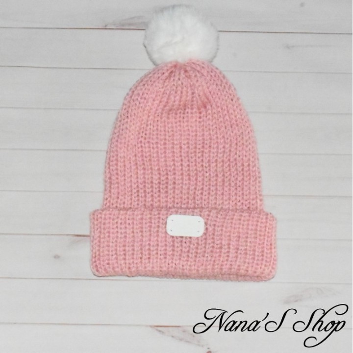 Bonnet fille, tricoté mains, à revers et doublé, de couleur rose pâle uni, pompon et détail blanc