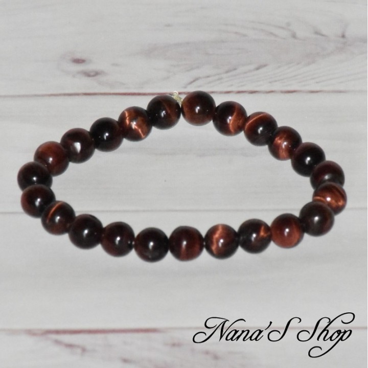 Bracelet fait main, en œil de taureau, dans les tons rouge marron foncé.