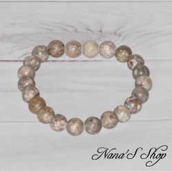 Bracelet de perle en Maïfanite, de couleur beige, fait main.