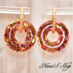 Pampilles interchangeables en forme de donuts, en résine et paillettes rouge et or, fait main, pour créoles à composer.