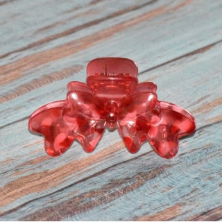 Pince crabe transparente, forme nœud, coloris rouge.