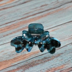 Pince crabe transparente, forme nœud, coloris bleu.