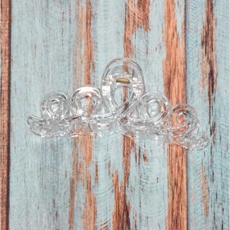 Pince à cheveux, forme boucles, en plastique, coloris blanc transparent. Pince à cheveux, forme boucles, en plastique, coloris blanc transparent.