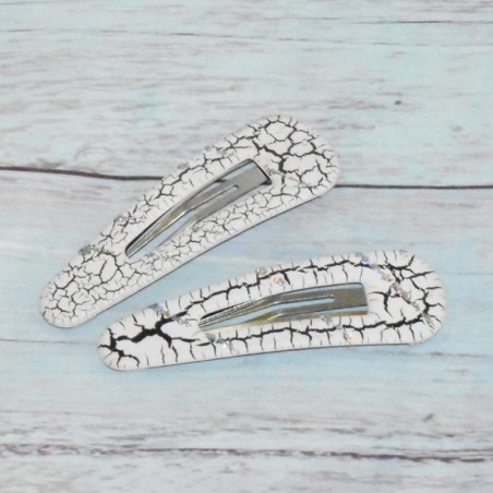 Barrette clic-clac, craquelés, coloris gris. Barrette clic-clac, craquelés, coloris gris.