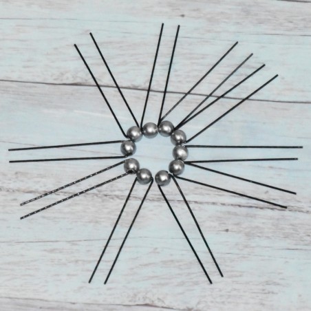 Lot de 10 piques à chignon, perle nacré, coloris gris. Lot de 10 piques à chignon, perle nacré, coloris gris.