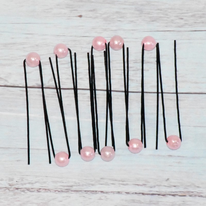 Lot de 10 piques à chignon, perle nacré, coloris rose clair. Lot de 10 piques à chignon, perle nacré, coloris rose clair.