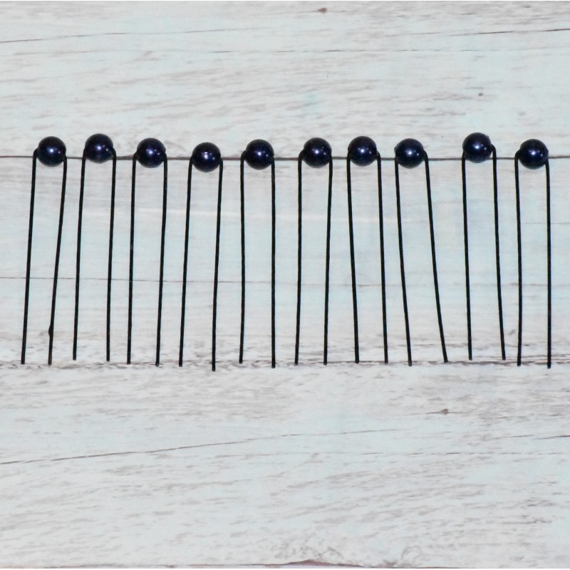 Lot de 10 piques à chignon, perle nacré, coloris bleu marine. Lot de 10 piques à chignon, perle nacré, coloris bleu marine.