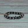 Bracelet en cristal et anneaux métallique, coloris noir anthracite.