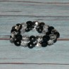 Bracelet perles facettés en plastique, double rang, coloris noir et transparent.