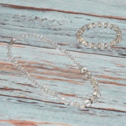 Parure en cristal, collier, coloris blanc transparent.