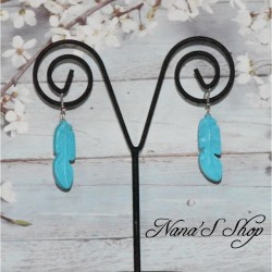 Boucles d'oreilles Plume, en pâte polymère, coloris bleu turquoise.