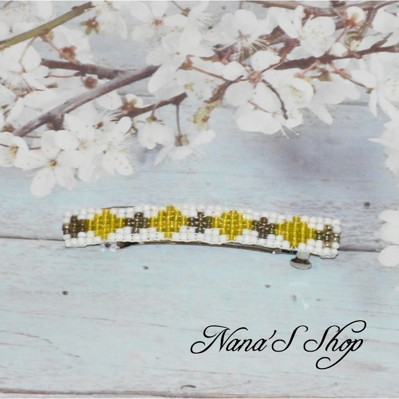 Barrette à cheveux, en perles tissé, blanche, coloris jaune. Barrette à cheveux, en perles tissé, blanche, coloris jaune.