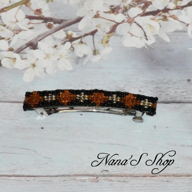 barrette à cheveux, en perles tissé, noire, coloris orange. barrette à cheveux, en perles tissé, noire, coloris orange.