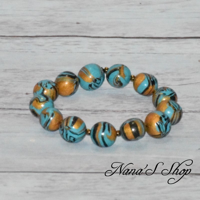 Bracelet en perles pâte polymère, couleur bleu turquoise et or.
