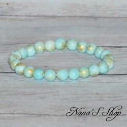 Bracelet élastique en perles, pierre en Dolomite, tons bleu ciel et or.