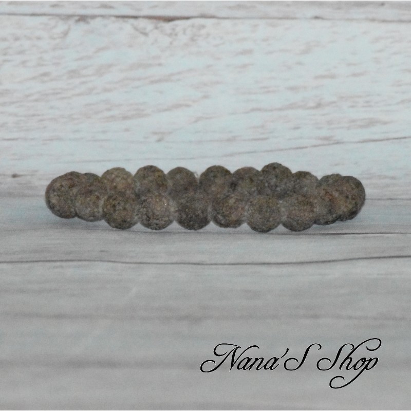 Bracelet élastique en perles pierre de lave 8mm, coloris marron. Bracelet élastique en perles pierre de lave 8mm, coloris marron.
