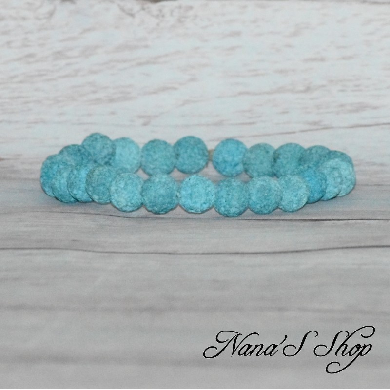 Bracelet élastique en perles pierre de lave 8mm, coloris bleu clair.