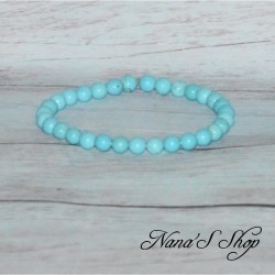 Bracelet élastique, fin en perles, pierre turquoise.