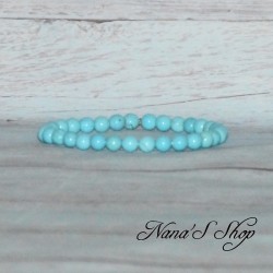 Bracelet élastique, fin en perles, pierre turquoise.