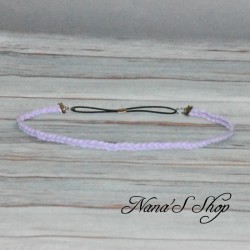 Headband tressé en suédine, coloris uni mauve.