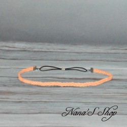 Headband tressé en suédine, coloris uni corail.