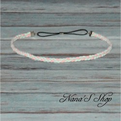 Headband bicolore tressé, en suédine, coloris menthe et rose pâle.