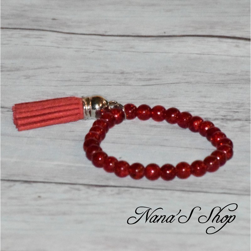 Bracelet fantaisie, perles de verre craquelés  et tassel, coloris rouge.