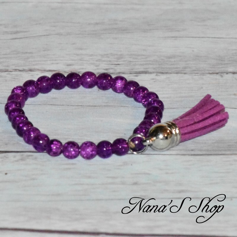 Bracelet fantaisie, perles de verre craquelés et tassel, coloris violet. Bracelet fantaisie, perles de verre craquelés et tassel, coloris violet.