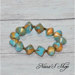 Bracelet élastique, perles colorées et dorées, coloris bleu turquoise.