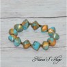 Bracelet élastique, perles colorées et dorées, coloris bleu turquoise.