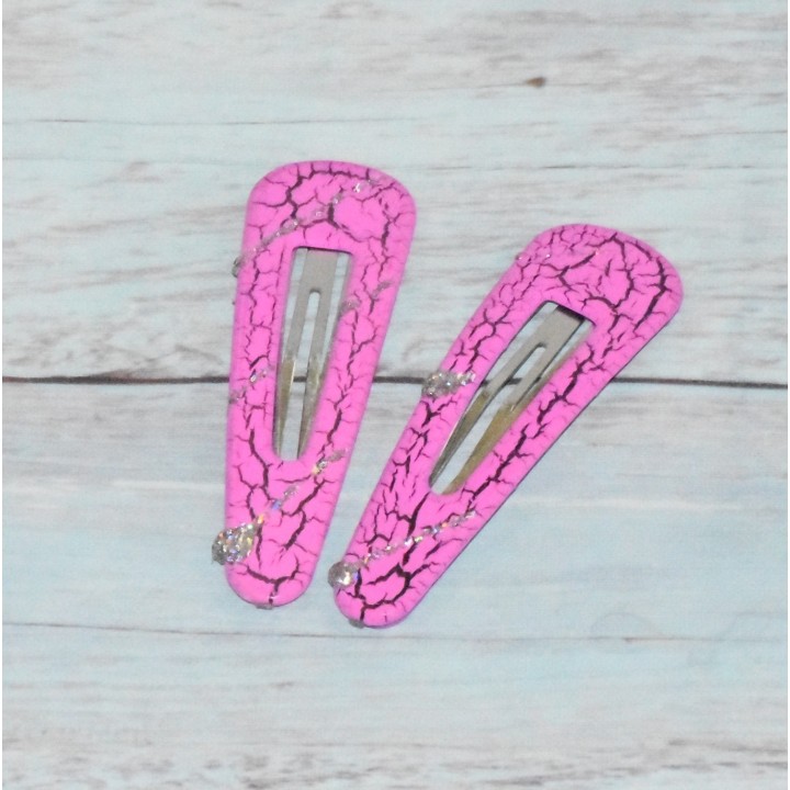 Barrette clic-clac, craquelés, coloris rose.