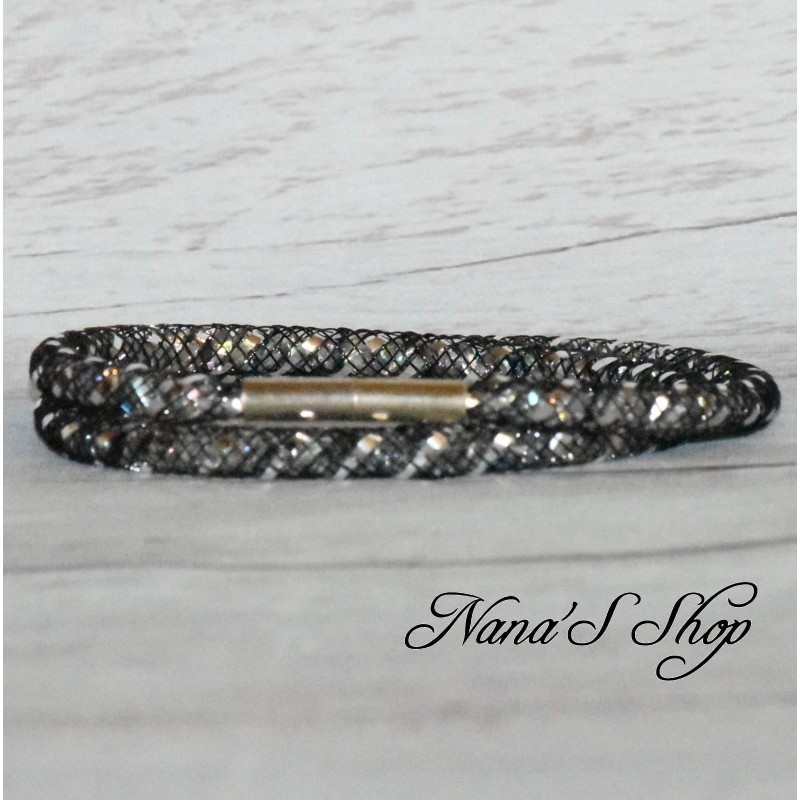 Collier / bracelet double, fine résille noire, effet stardust, coloris argent. Collier / bracelet double, fine résille noire, effet stardust, coloris argent.