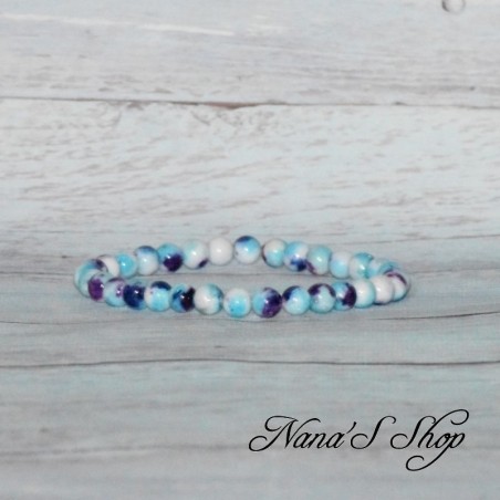Bracelet élastique en perles, pierre Jadéite et néphrite dégradé violet et bleu. Bracelet élastique en perles, pierre Jadéite et néphrite dégradé violet et bleu.