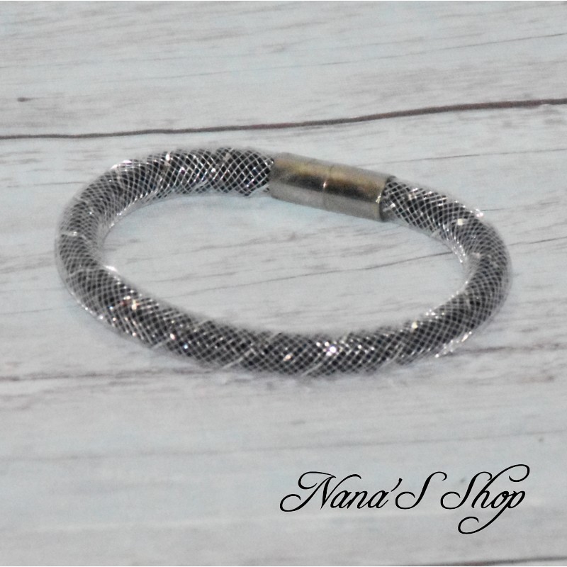 Bracelet fantaisie, grosse résille blanche, Stardust, coloris noir. Bracelet fantaisie, grosse résille blanche, Stardust, coloris noir.